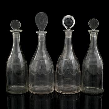 Four glass decanters, early 19th century.