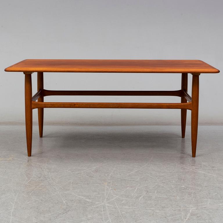 a teak coffee table from Denmark in the second half of the 20th century.