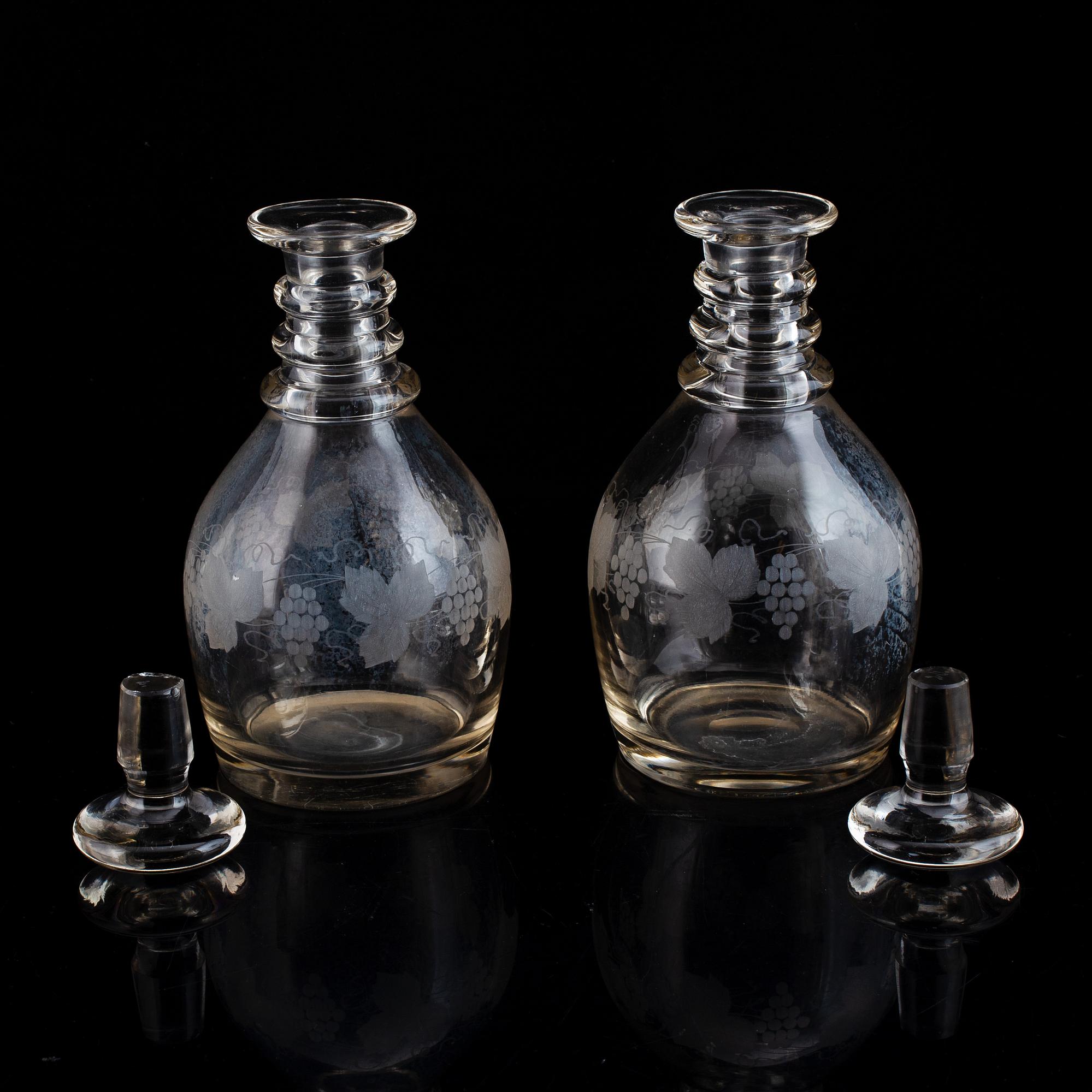 A pair of mid 19th century glass decanters and stoppers.