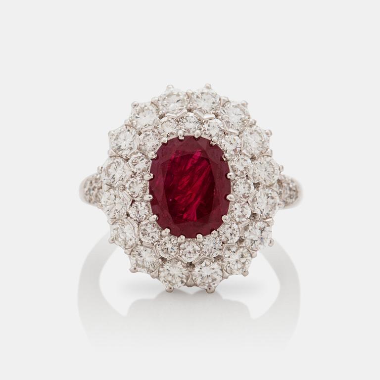 An untreated 4.33 ct, burmese ruby and brilliant cut diamond ring. Cert SSEF.