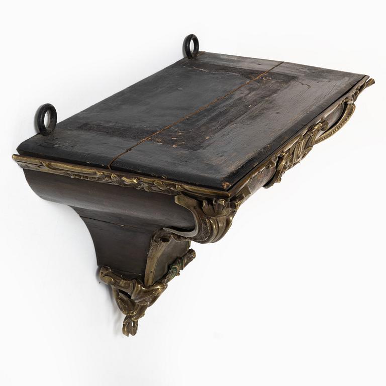 A presumably French Louis XV bronze-mounted console, mid 18th century.