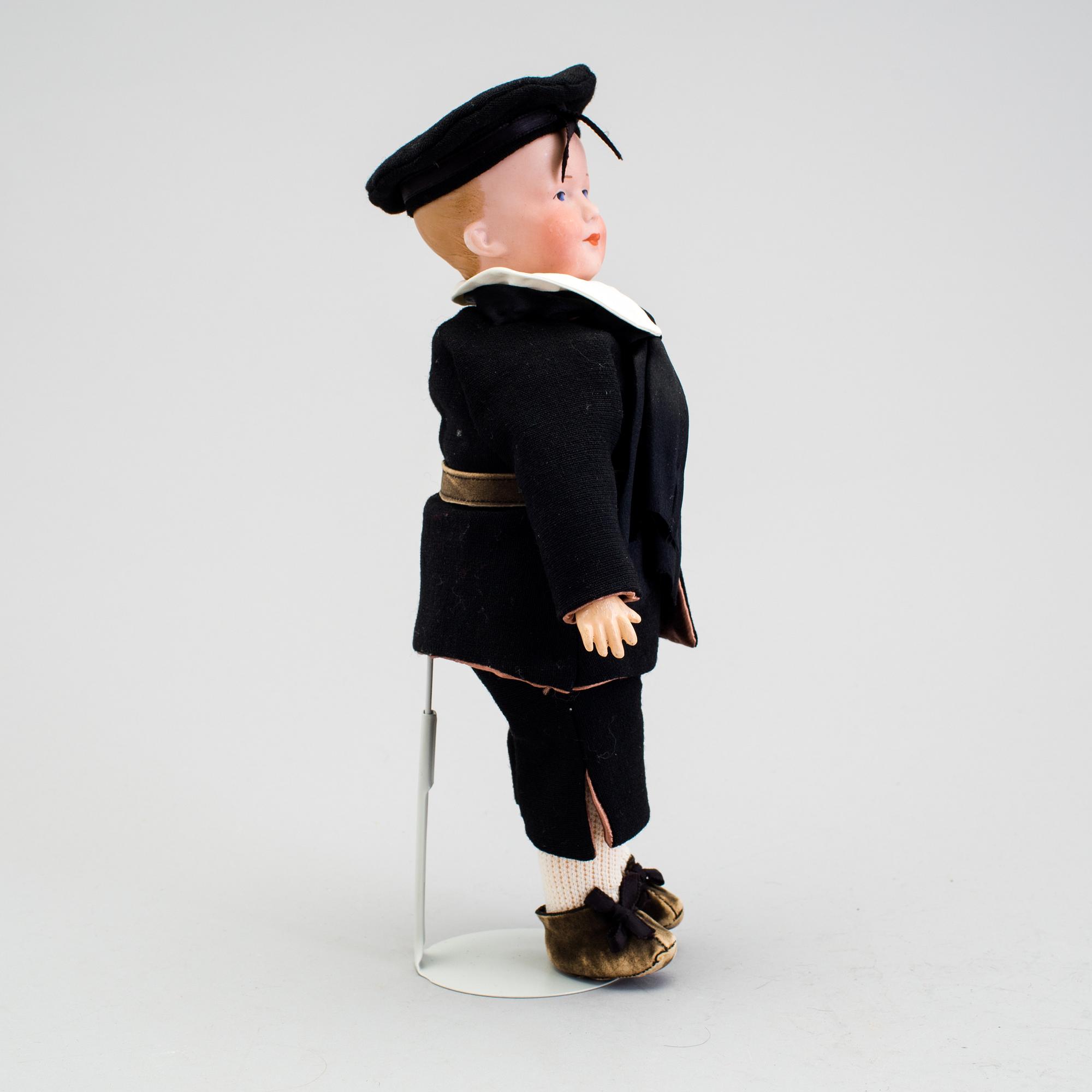 A bisque headed character doll 500 by Armand Marseille, Germany, ca 1910.