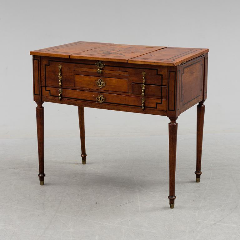 An end of the 18th century dressing  table with drawers and mirror.