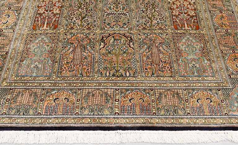 A silk Kashmir carpet, 295 x 178 cm.