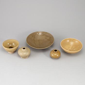 A group of five brownish glazed vessels, South East Asia, Songstyle, 20th Century.