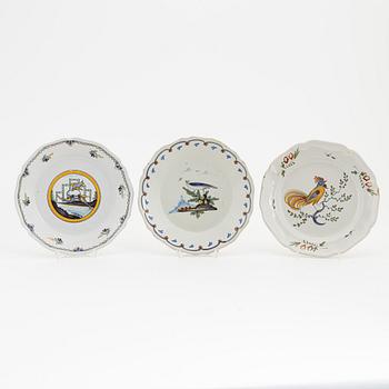 16 earthenware plates and two dishes, mostly french, 18th century.