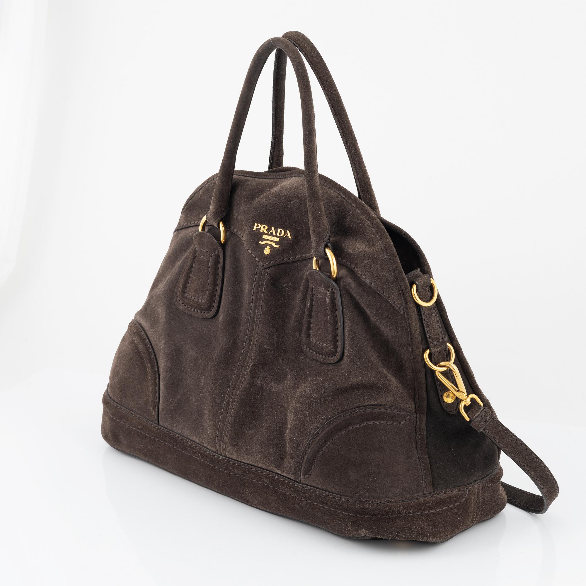 Prada a chocolate brown suede handbag. Bukowskis