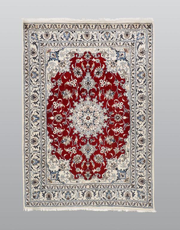 A rug, Nain part silk, ca 208 x 149 cm.