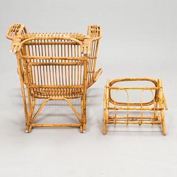 A 1950s rattan easy chair with ottoman and a magazine stand, Urjalan Koritehdas, Finland.