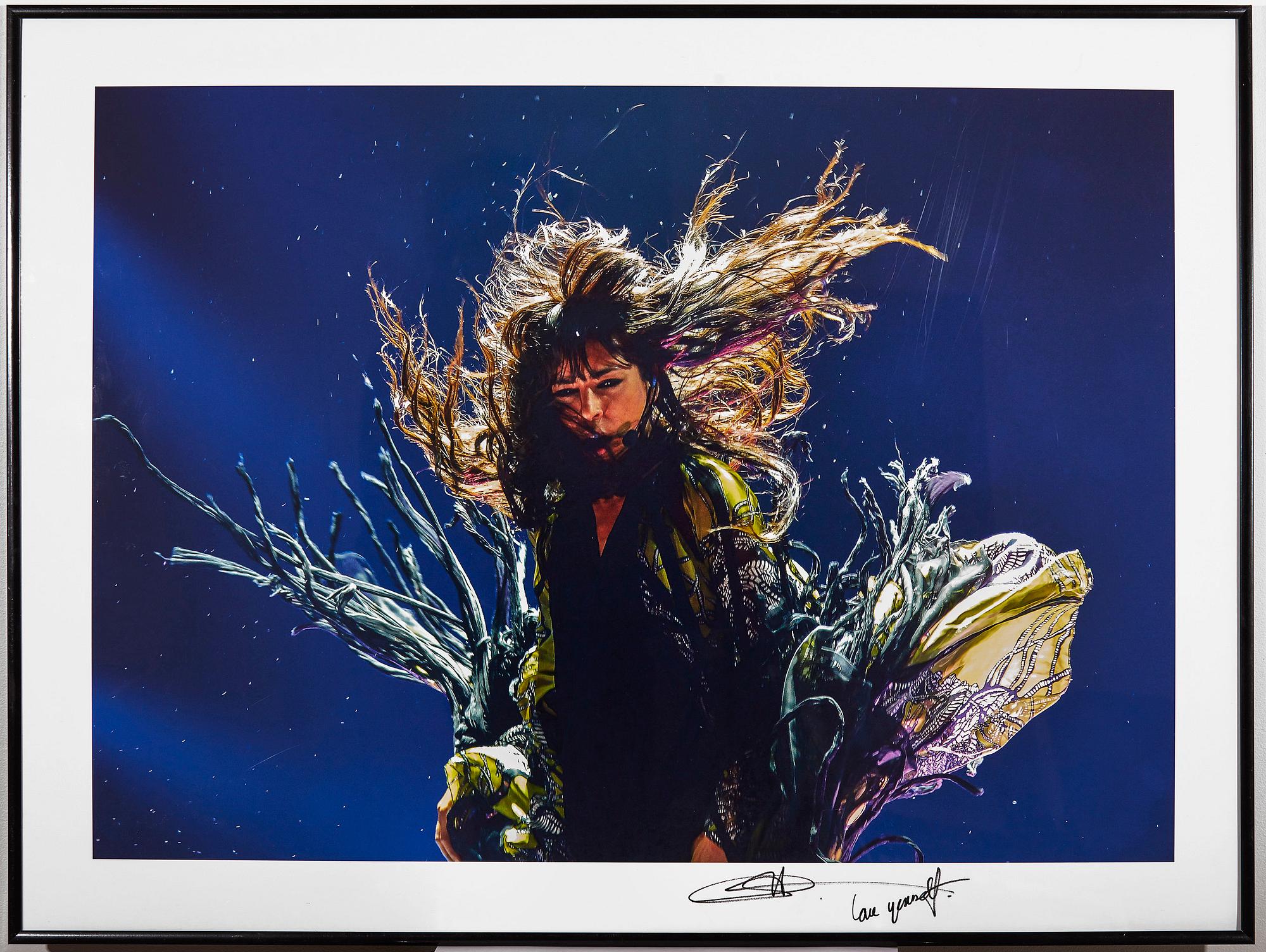 ANDRES PUTTING, pigment print "Loreen". Signed by Loreen and numbered 1/2.