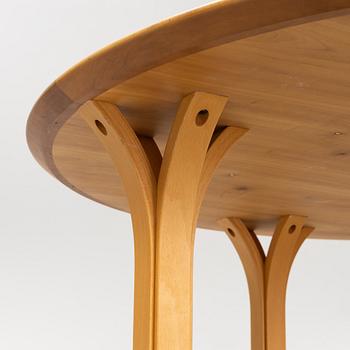 A birch dining table, IFORM, Malmö, dated 2003.
