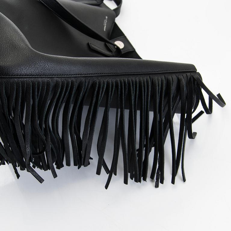 Saint Laurent, a 'Sac shopping' bag.