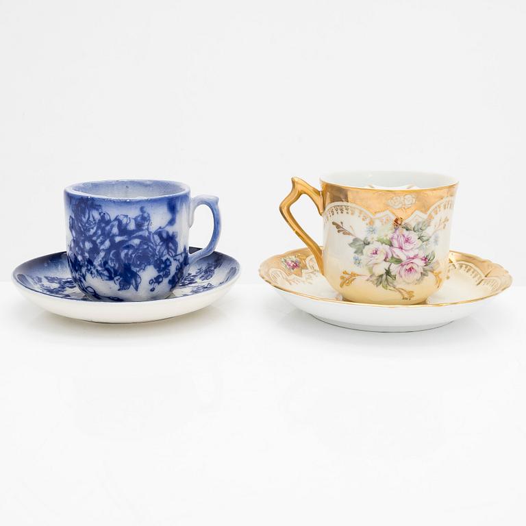 A set of 12 pair of porcelain mustache cups, including Germany, 19th and 20th century.