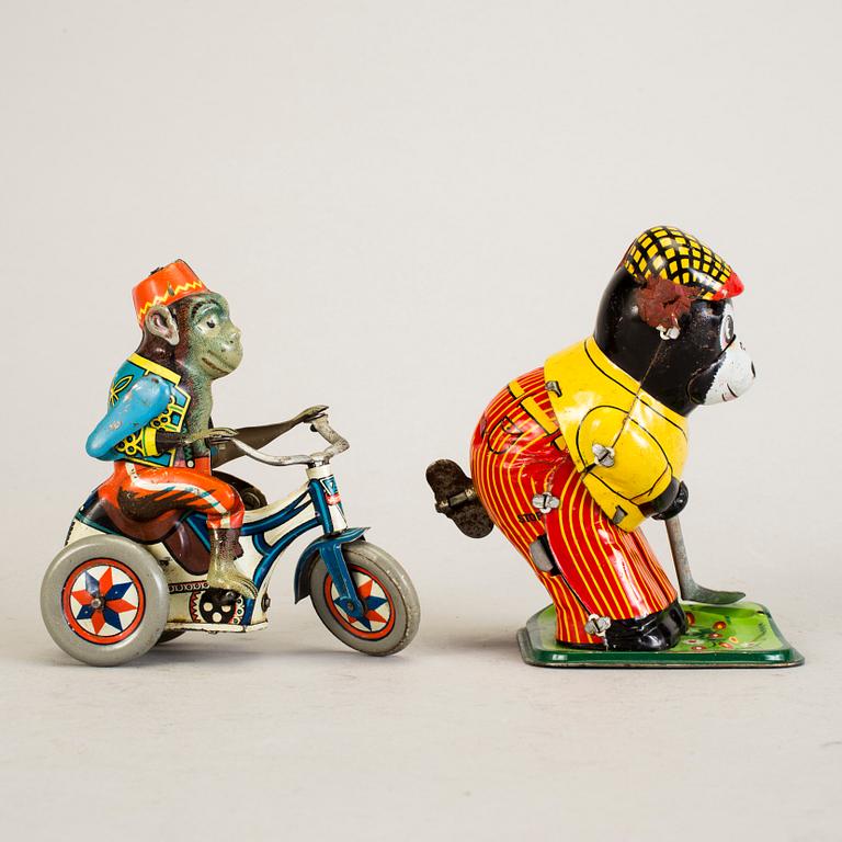 A lot of three tinplate toys Japan and Germany 1950s.