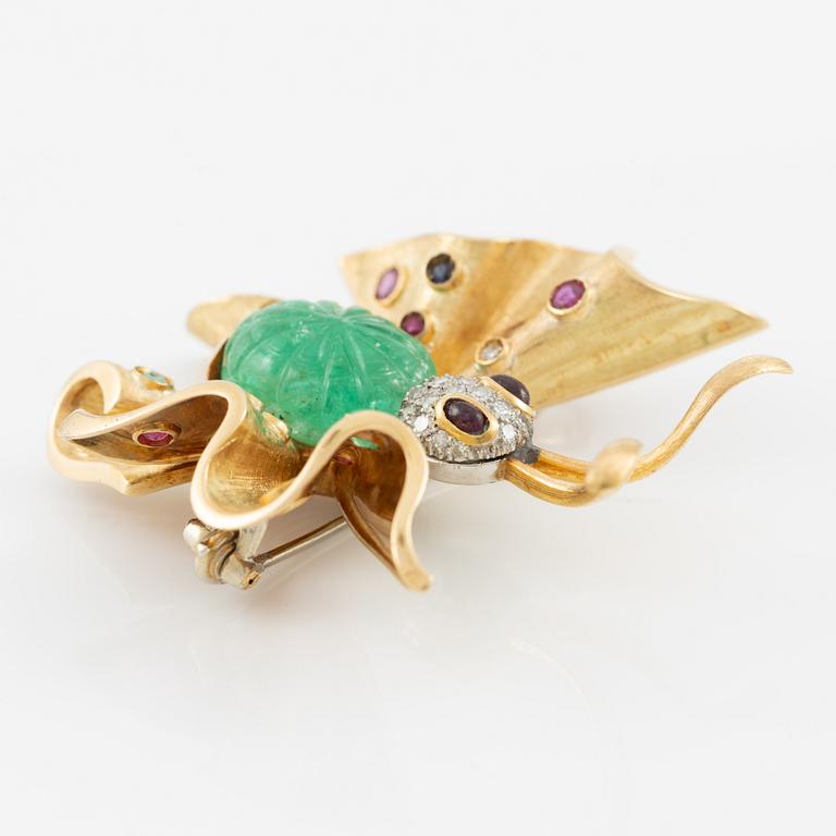 Brooch in the form of a butterfly, 14K gold with carved emerald, sapphires, emeralds, rubies, and diamonds. Second half of the 20th century.