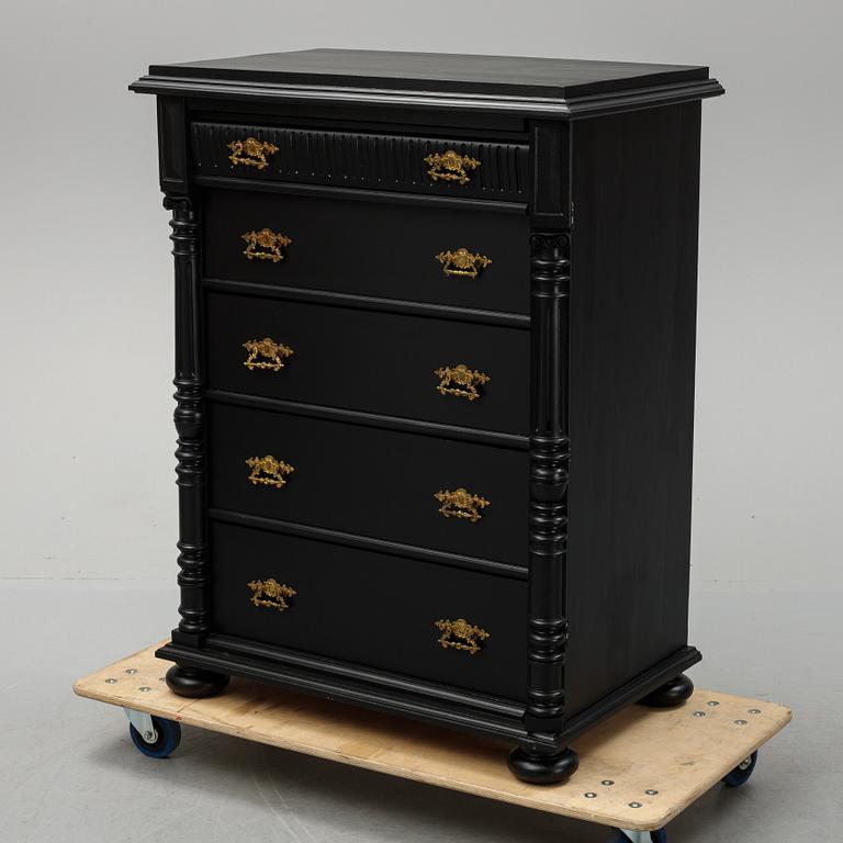A painted chest of drawers, circa 1900.