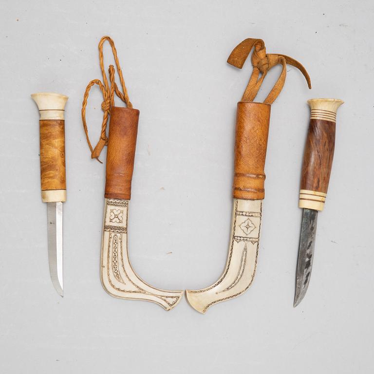 Lars Olov Parfa, two reindeer horn Sami knives, signed.