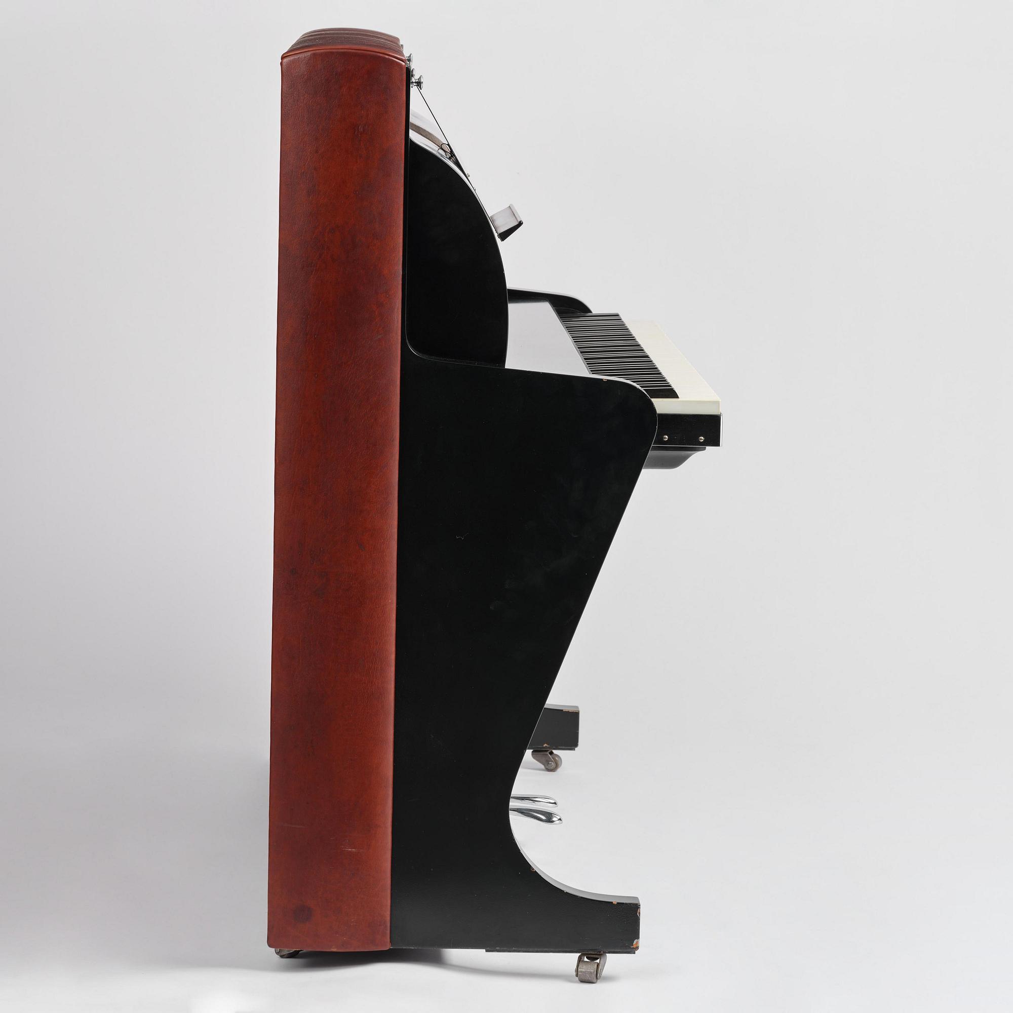 Poul Henningsen, a "PH Upright Piano", executed by Andreas Christensen, Denmark, 1940s.