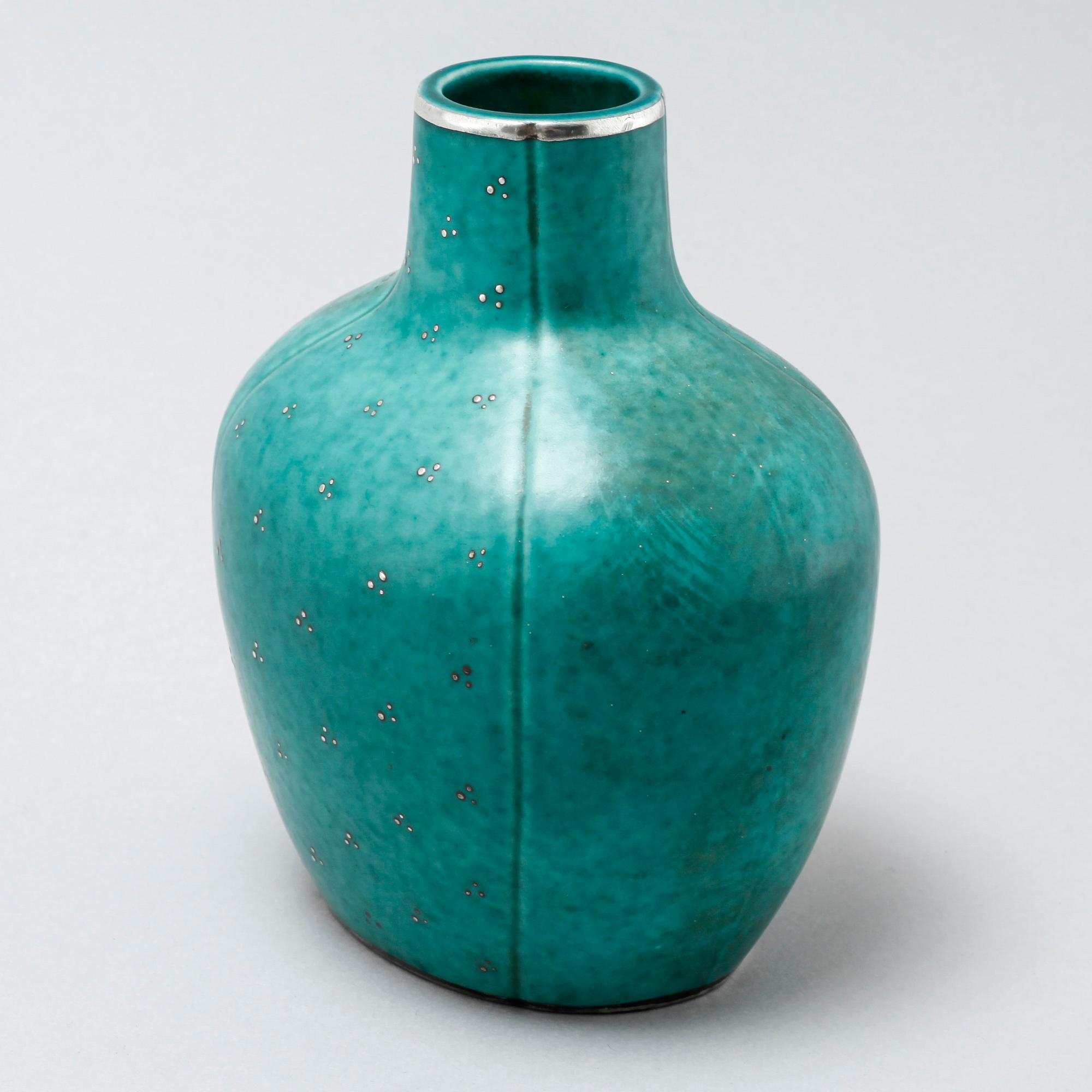 A stoneware vase and a dish by Wilhelm Kåge for Gustavsberg, 20th century.