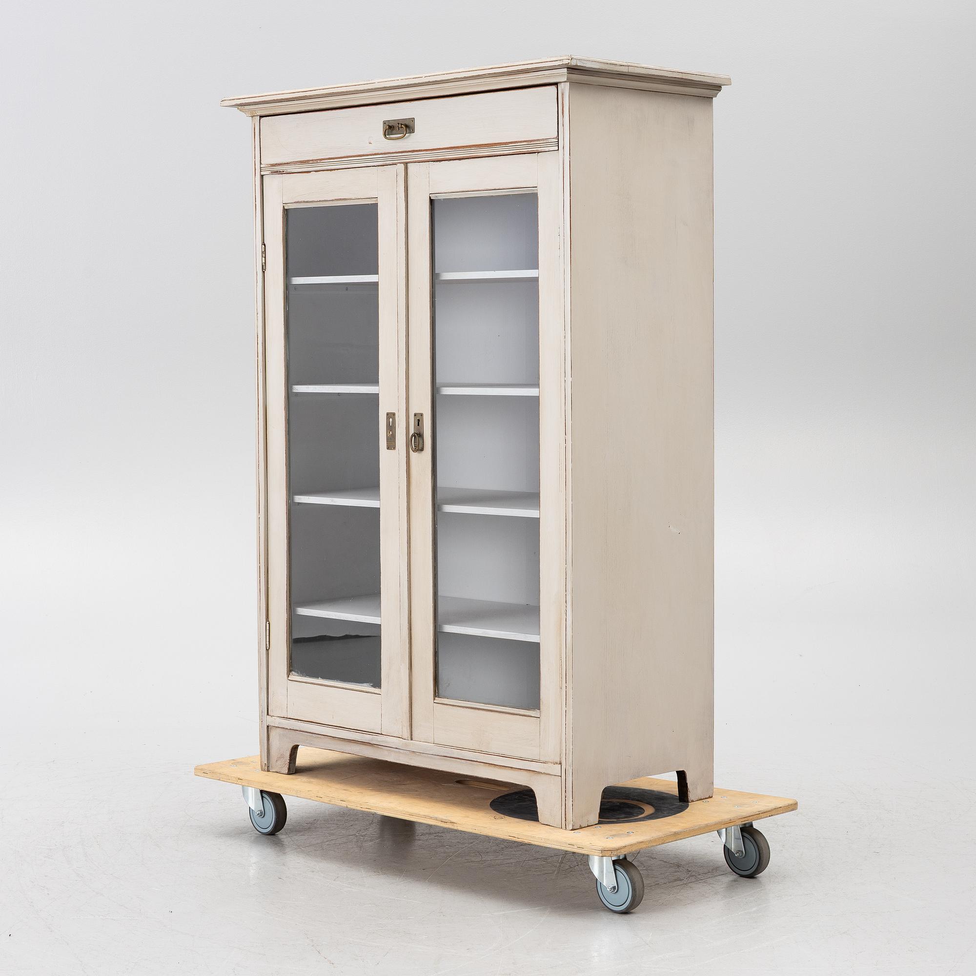 Display cabinet, early 20th century.