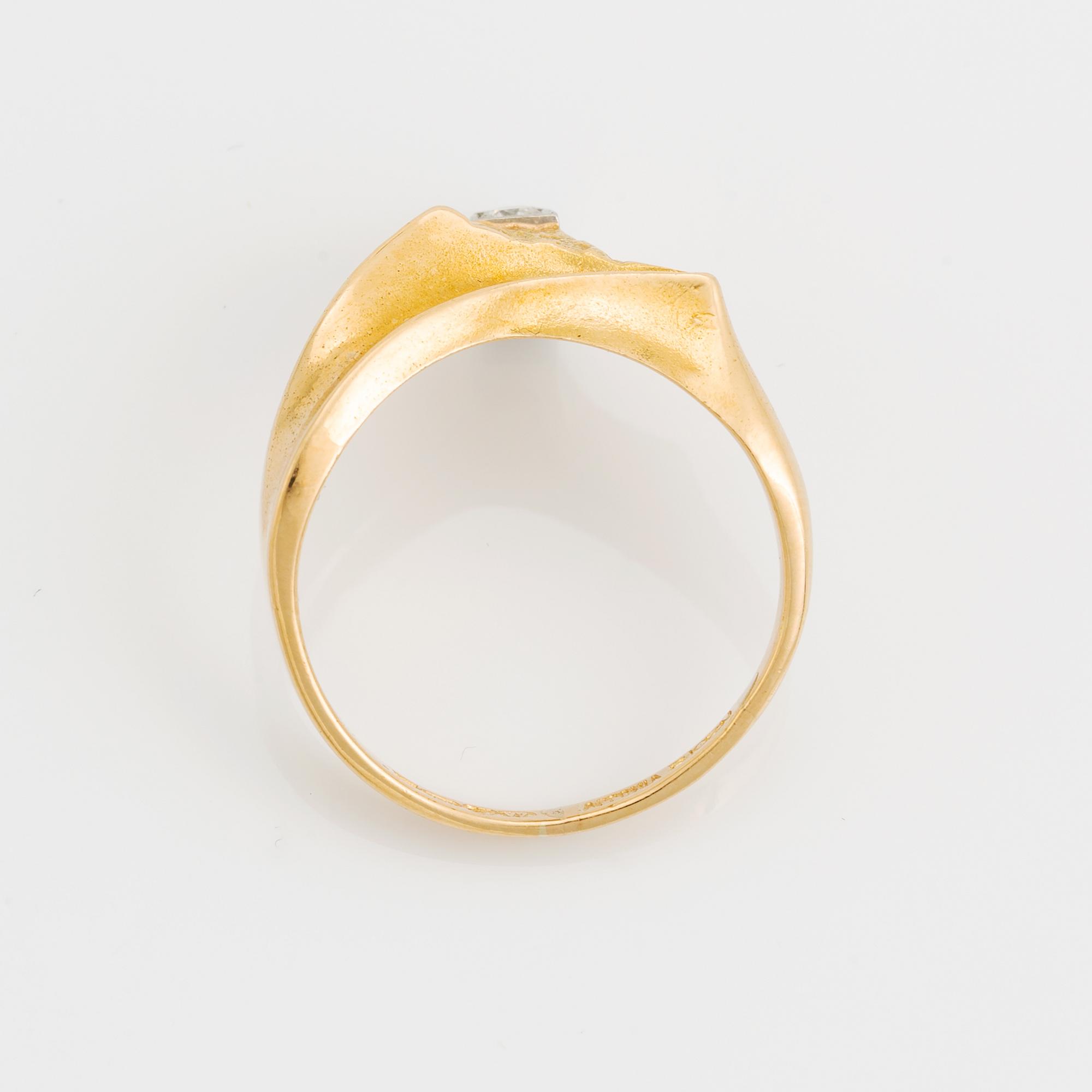 Björn Weckström, An 18K gold Lapponia ring DIamond promise" set with a round brilliant-cut diamond.