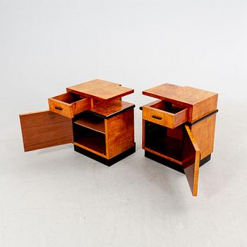 A pair of veneered masur birch bedside tables from the first half ot the 20th century.