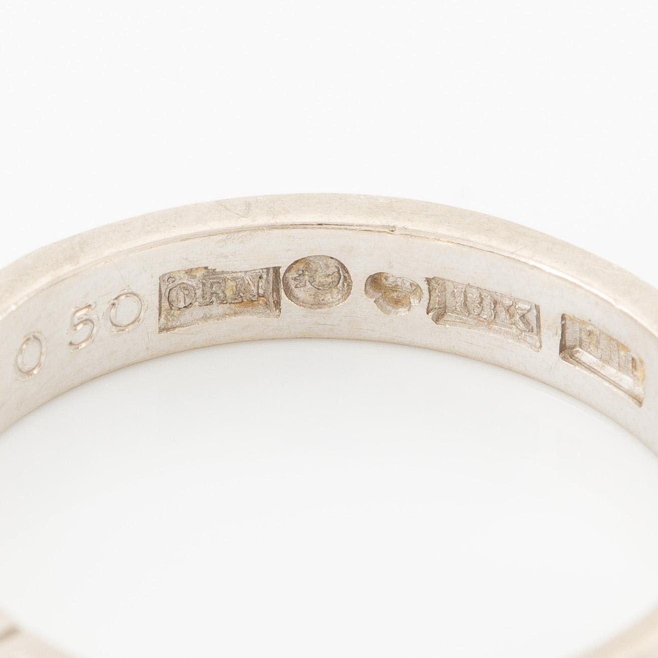 Ring, half eternity band in 18K white gold set with brilliant-cut diamonds.