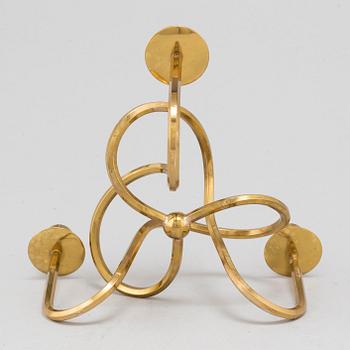 JOSEF FRANK, a brass candelabrum, Firma Svenskt Tenn.