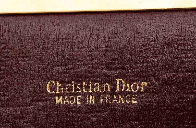 CHRISTIAN DIOR, weekendbag samt clutch.