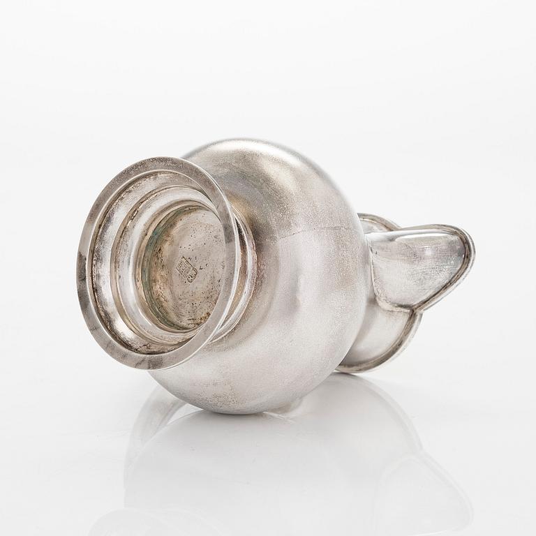 A four-piece silver coffee set, St. Petersburg 1887, original fitted box from Khlebnikov. Sugar tong, Moscow around 190.