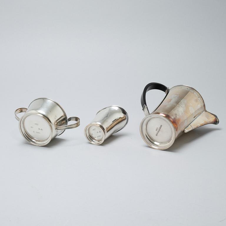 A silver coffee pot, sugar bowl and creamer by Thore Eldh for K&EC in Göteborg, 1949.