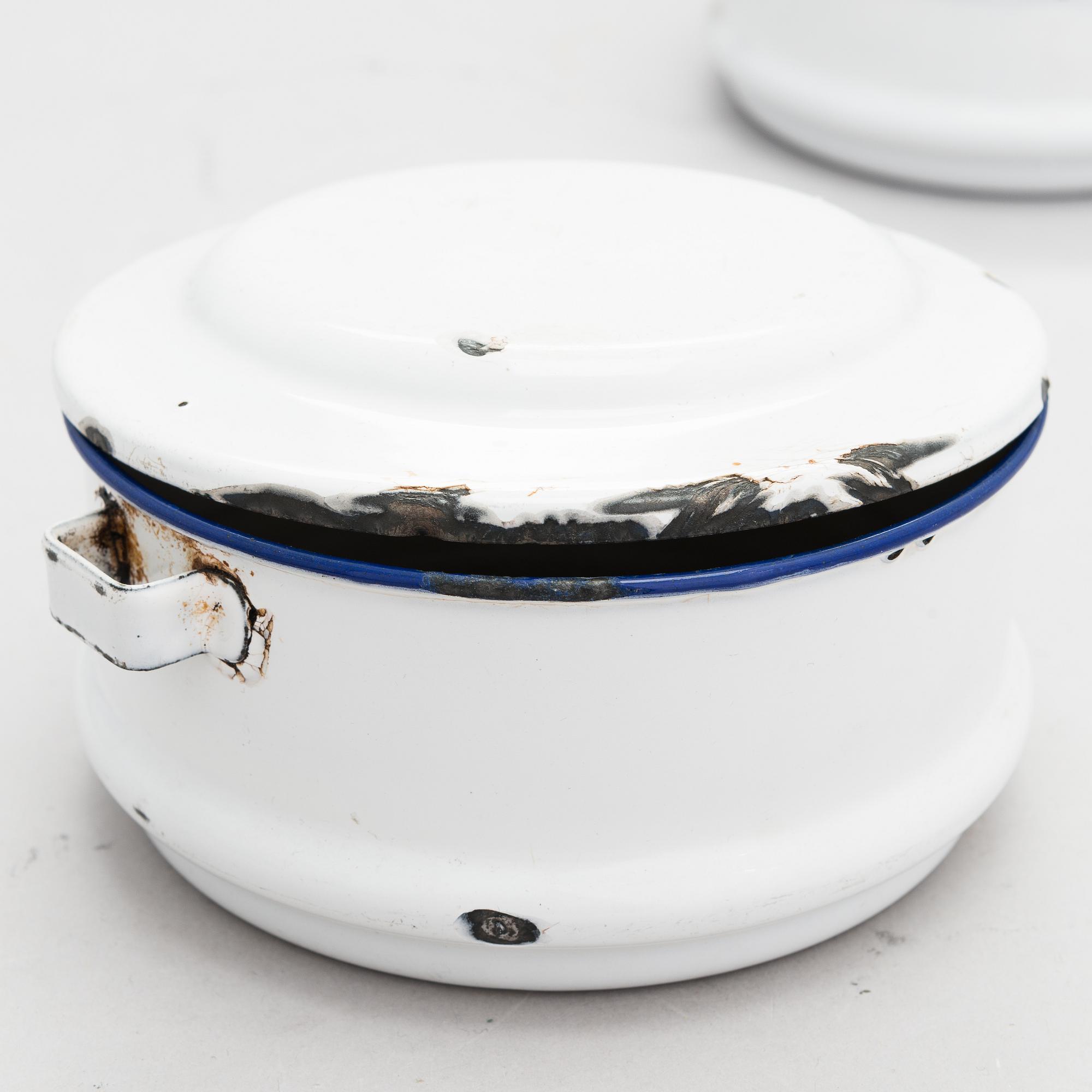 A set of 7 enamelled metal serving dishes. Kockums emaljverk and Finel.