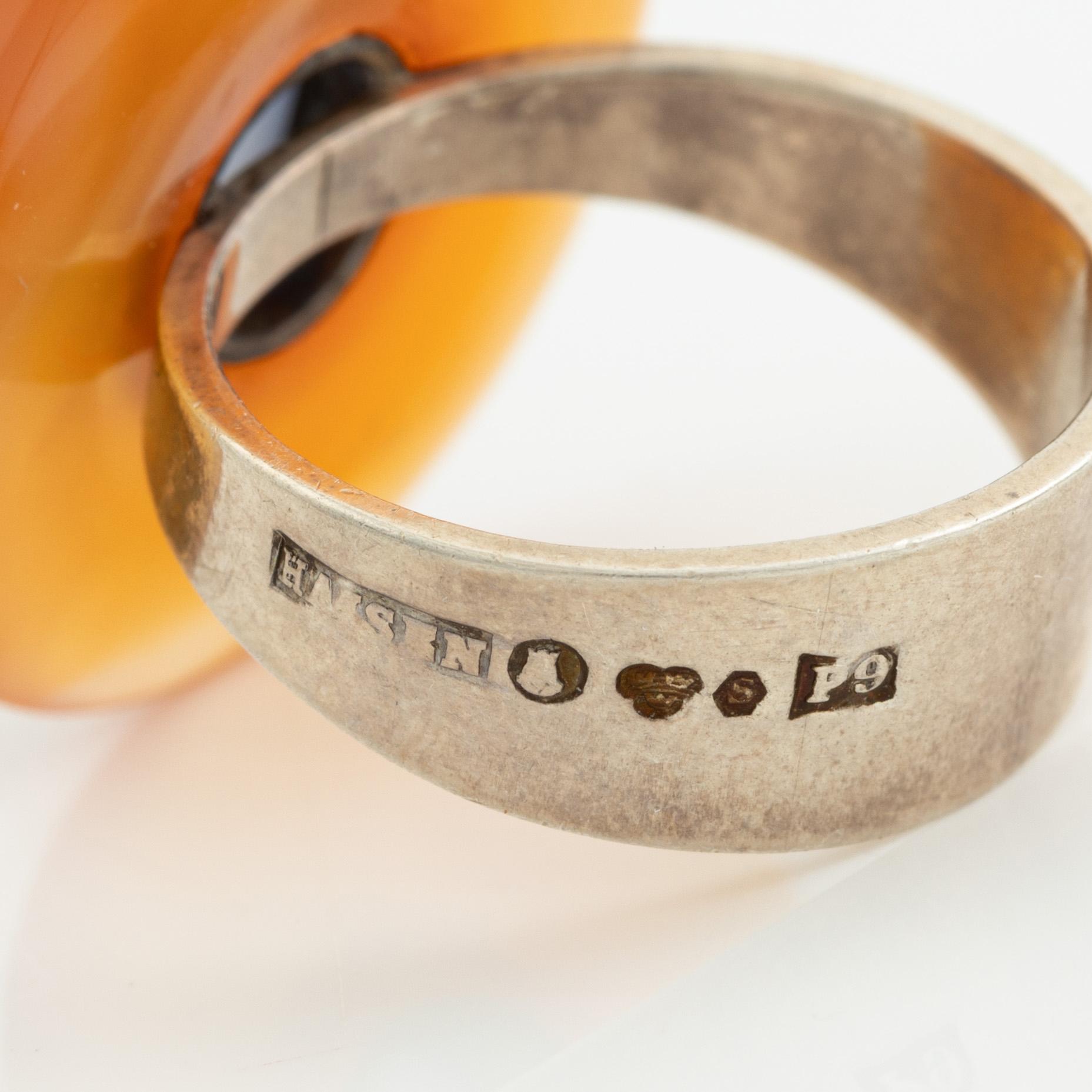 Four rings, silver and including carnelian, among others Cecilia Johansson, Gothenburg 1968.