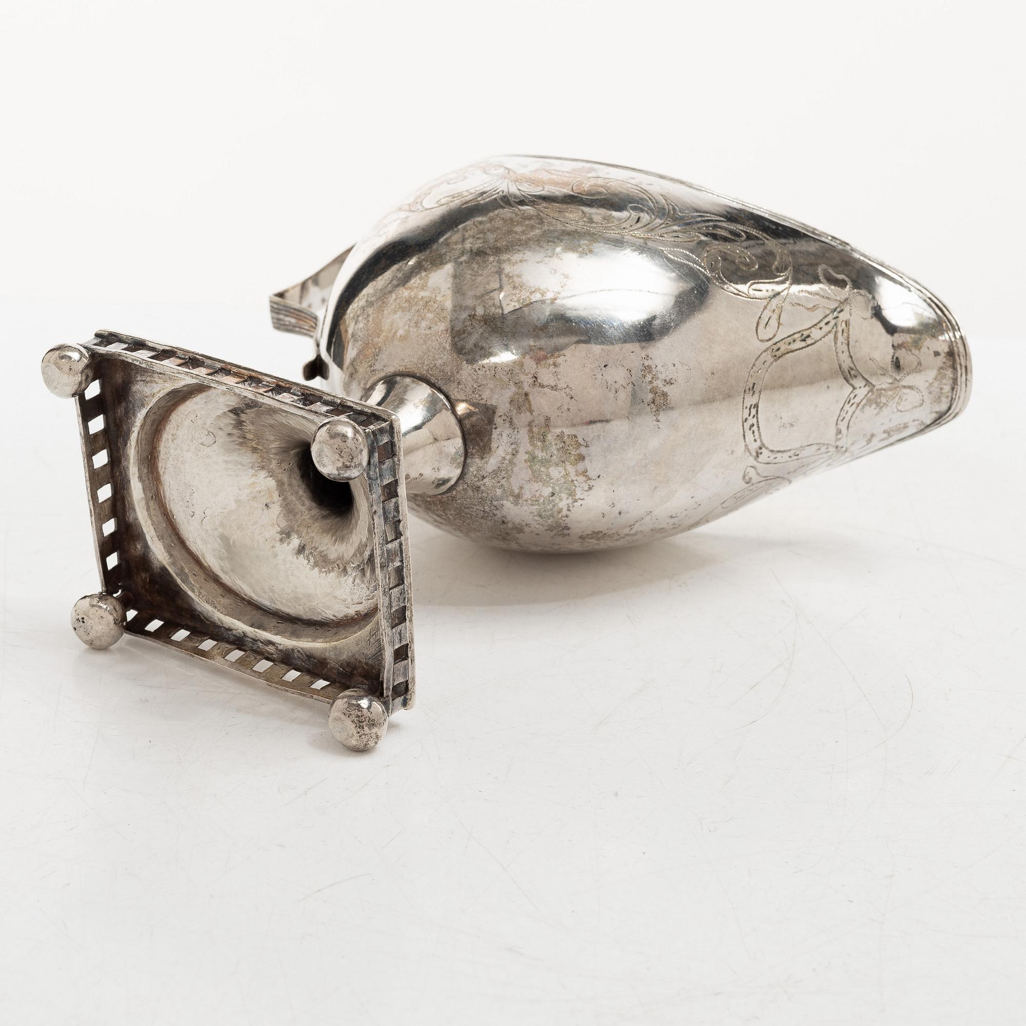 A Swedish Gustavian parcel-gilt silver sauce jug, mark of Daniel Hallman, Stockholm 1810.