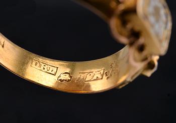 A RING, garnets, enamel. 18K gold, Olof Robert Lundgren Turku 1873. Size 20,5 , weight 2,9 g.