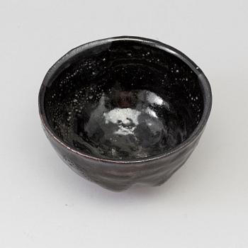 A Japanese Raku stoneware bowl, 20th century.