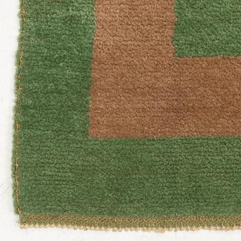 A pile carpet, c. 356 x 244 cm.