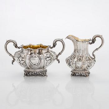 A sterling silver sugar bowl and milk jug, London 1842.