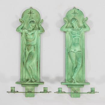 A pair of Art Deco wall sconces, patinated plaster and metal, A. E. Lindskog fecit MCMXXXX.