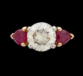 A brilliant cut diamond, 3.63 ct, and ruby ring.