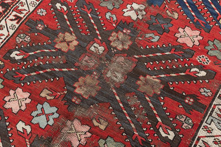 Rug, "Sunburst", Kazak, circa 250 x 137 cm.