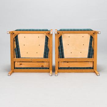 Åke Axelsson, a pair of 'Neptunus' armchairs, Galleri Stolen, Sweden.
