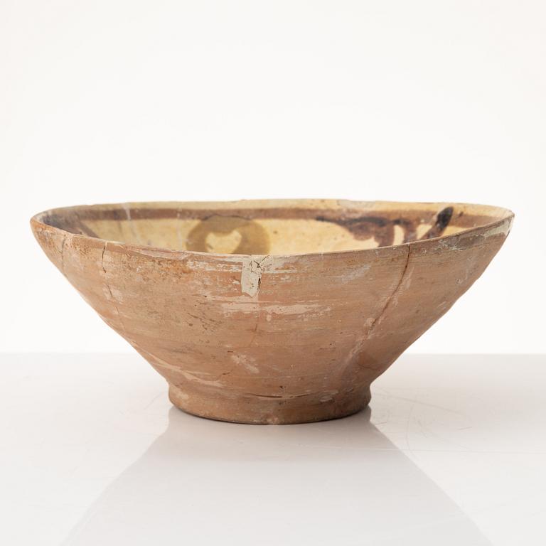 A glazed earthenware bowl, possibly Hispano-Moresque.