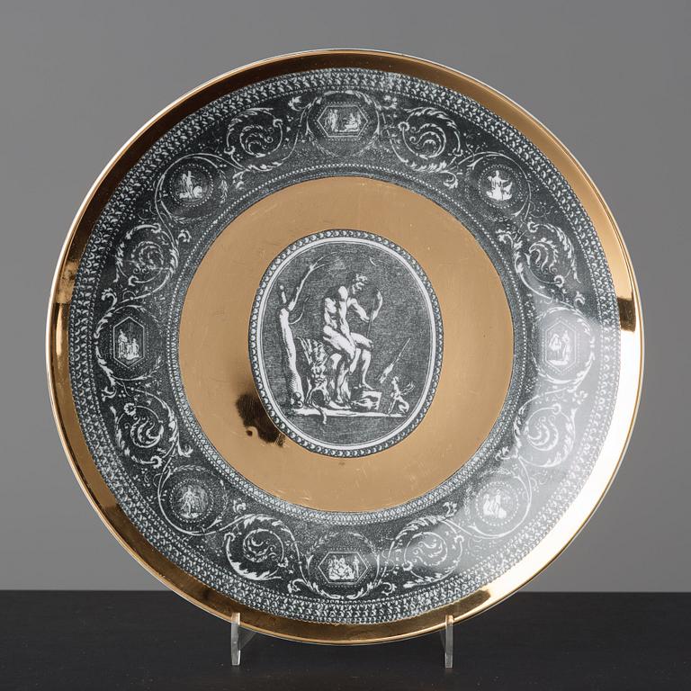 Piero Fornasetti, a set of six "Cammei" porcelain plates, Milano, Italy.
