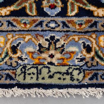 A CARPET, Kashan, signed ca  365 X 277 cm.