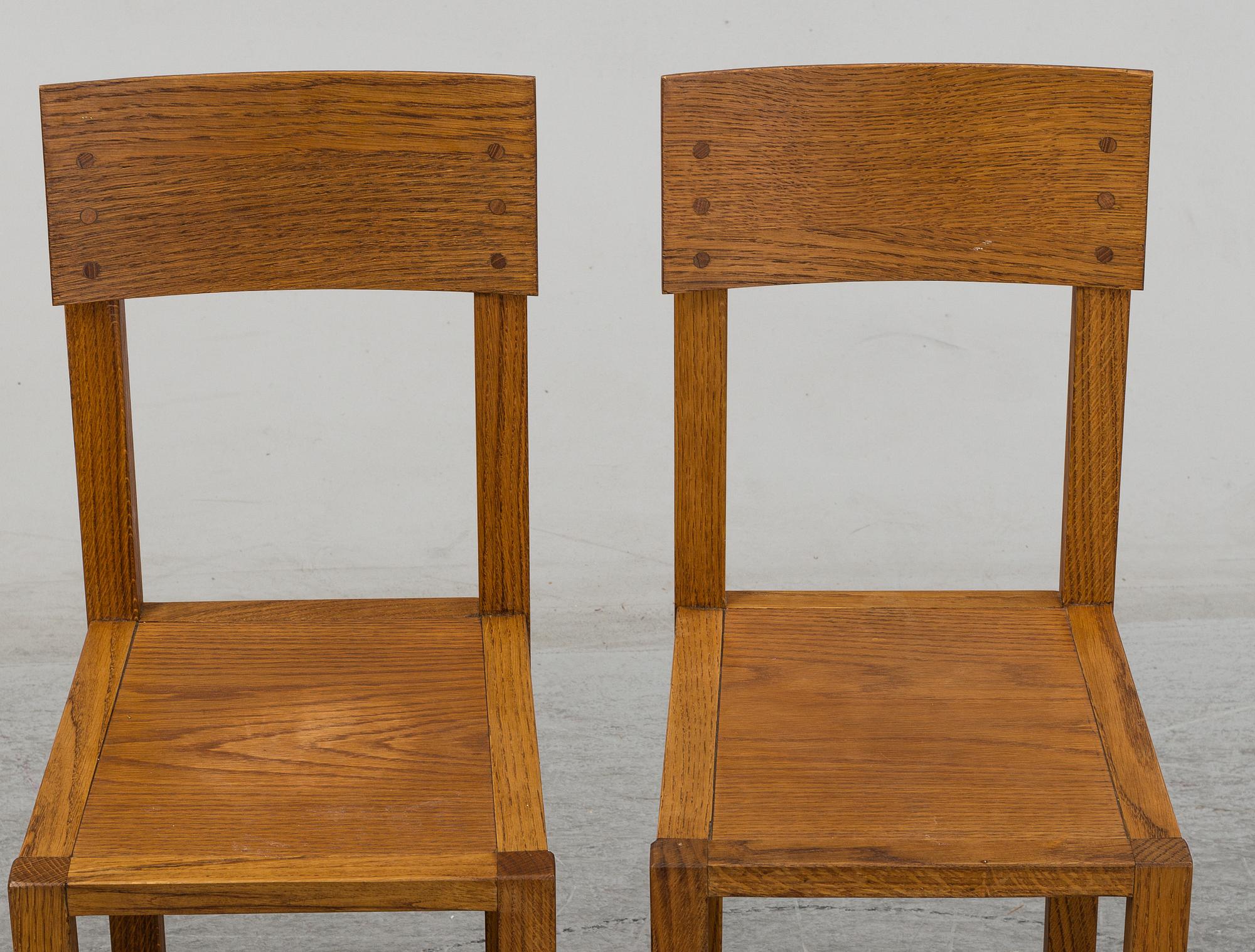 MARIO PRANDINA, an oak table and four chairs, Plinio Il Giovane, Italy.
