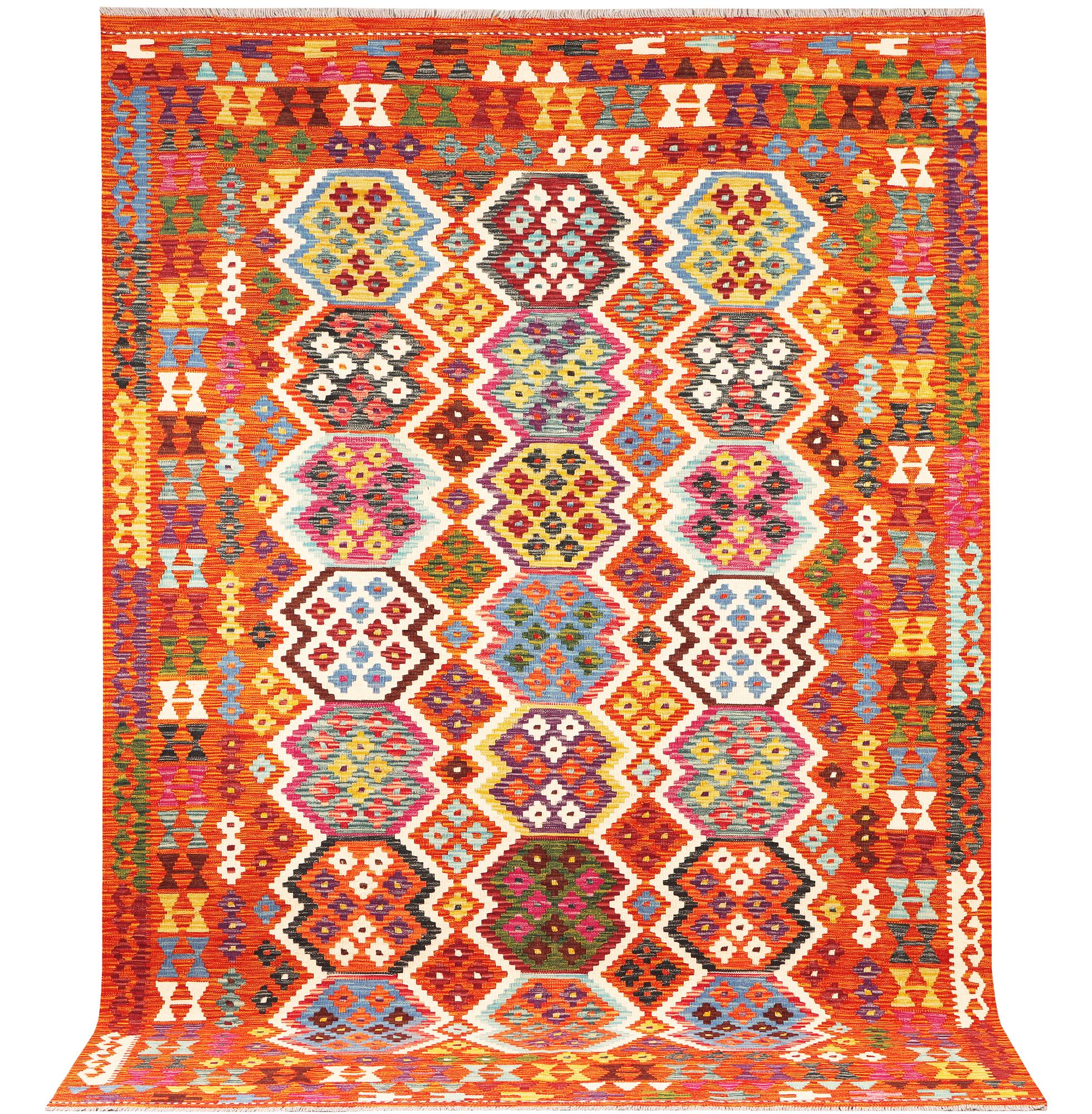An Afghan kilim rug, c. 290 x 203 cm.