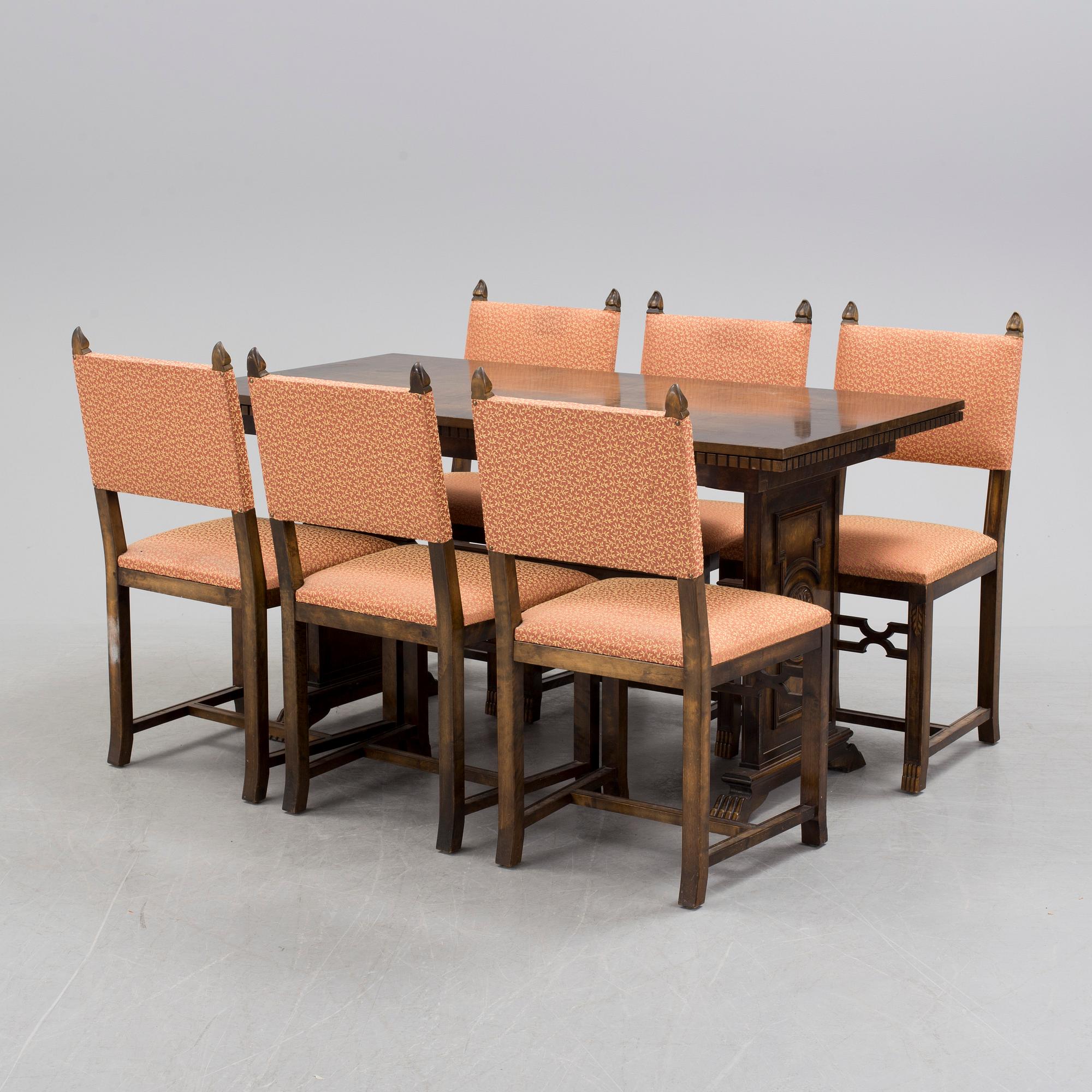 A 1920´s dinner table and six chairs probably designed by Axel Einar Hjorth for AB Svenska möbelfabriken Bodafors.