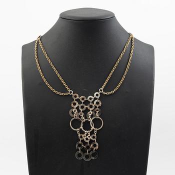 Siv Lagerström två collier vit metall.