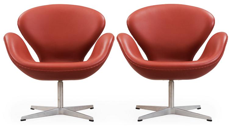 An Arne Jacobsen red leather 'Swan' chair, Fritz Hansen, Denmark 2001.